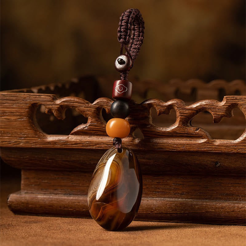 Buddha Stones Willekeurige sardonyxsteen positieve sleutelhanger - Willekeurige sardonyxsteen - image 0