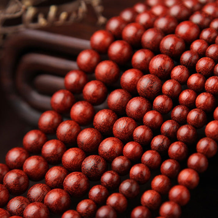 Buddha Stones Tibetaanse Mala - Armband met 108 kralen van rood sandelhout met kleine blaadjes. - image 5