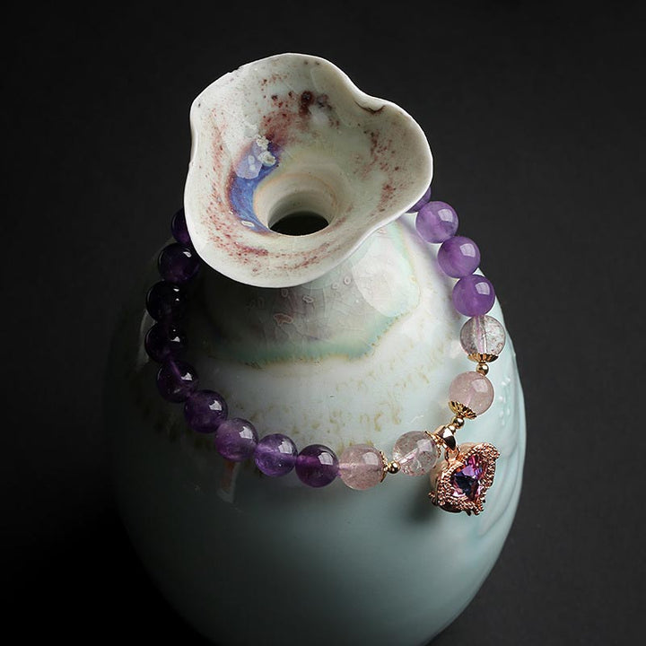 Armband van natuurlijke amethist en aardbeikwarts. - image 1