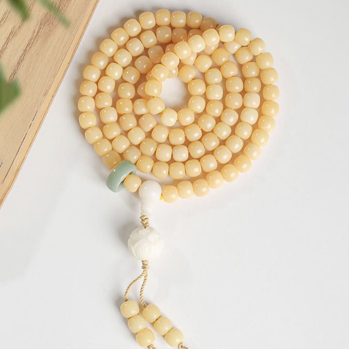Buddha Stones Armband met vredes- en harmoniebedel van natuurlijke bodhizaadlotus (Dzi-kraal) - image 10