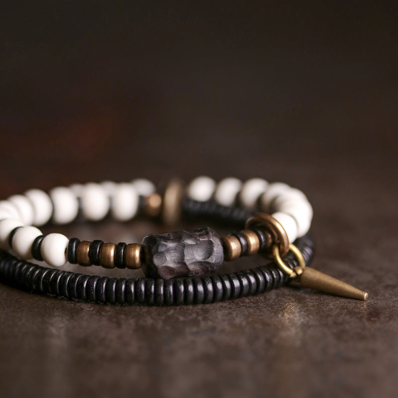 Buddha Stones Armband voor stellen, gemaakt van beenkralen, ebbenhout en koper. - image 6