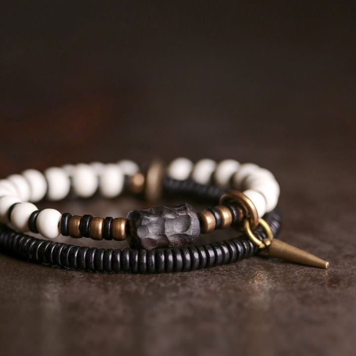Buddha Stones Armband voor stellen, gemaakt van beenkralen, ebbenhout en koper. - image 6