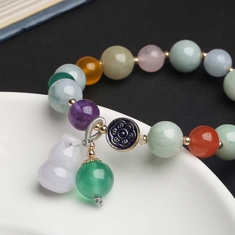 Armband van kalebas en jade - image 6