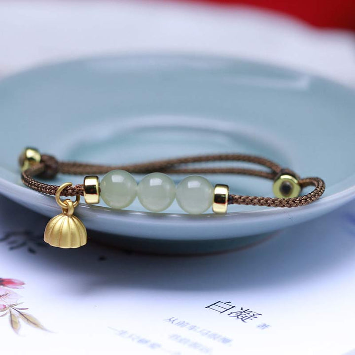 Buddha Stones Armband van natuurlijk jade, lotuszaad en rood koord. - image 8