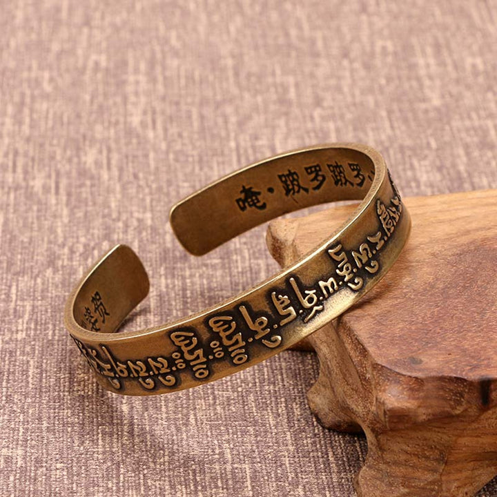 Buddha Stones Tibetaanse Mahāpratisarā Mantra Sanskriet Koper Messing Genezende Bangle-armband - image 0