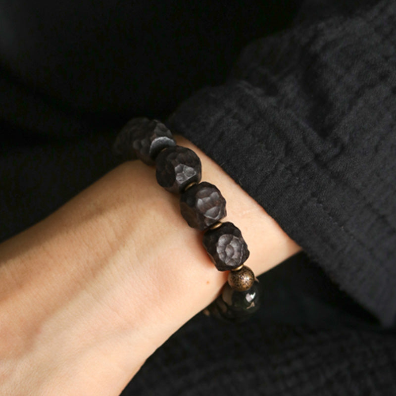 Buddha Stones Armband voor koppels, gemaakt van zwart obsidiaan, ebbenhout en koper. - image 4