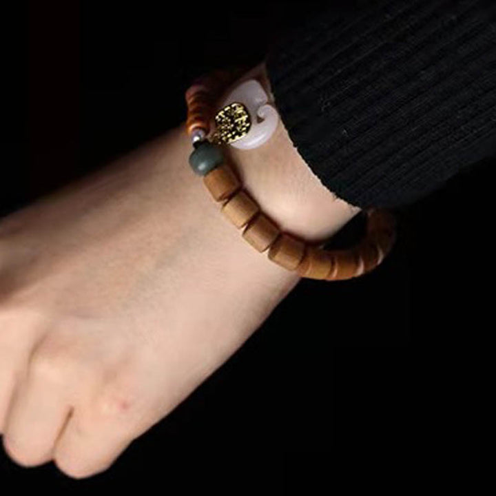 Buddha Stones Armband van sandelhout en jade met olifantje - image 2