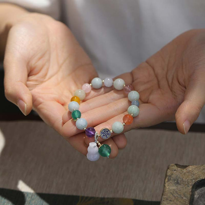 Armband van kalebas en jade - image 4