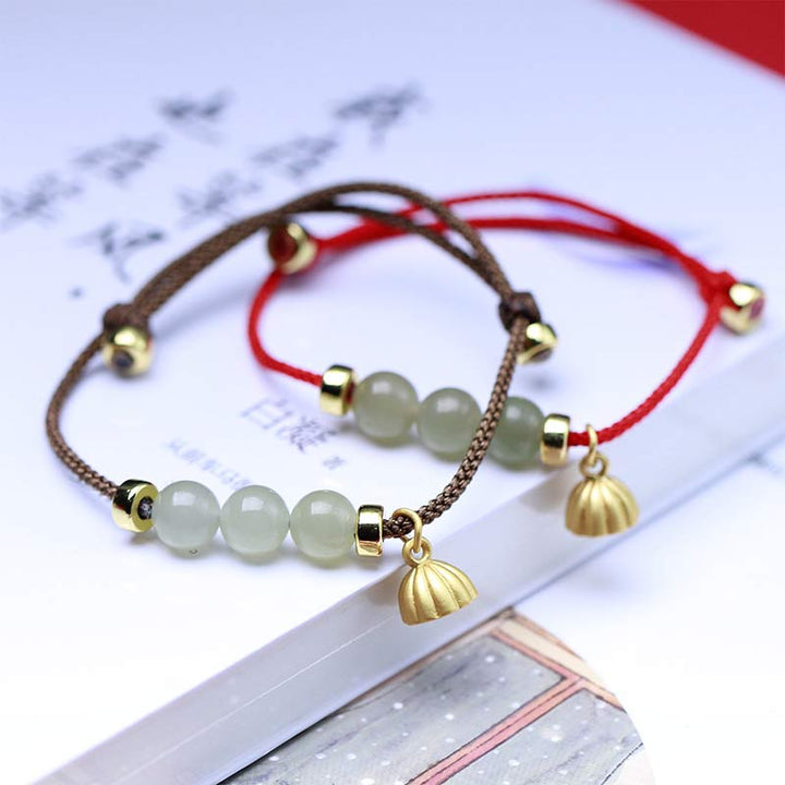Buddha Stones Armband van natuurlijk jade, lotuszaad en rood koord. - image 1