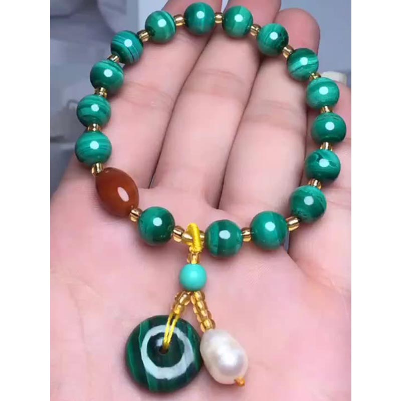 Armband met beschermende bedel van natuurlijke malachiet en rode agaat. - image 4
