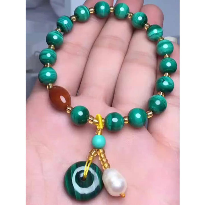 Armband met beschermende bedel van natuurlijke malachiet en rode agaat. - image 4