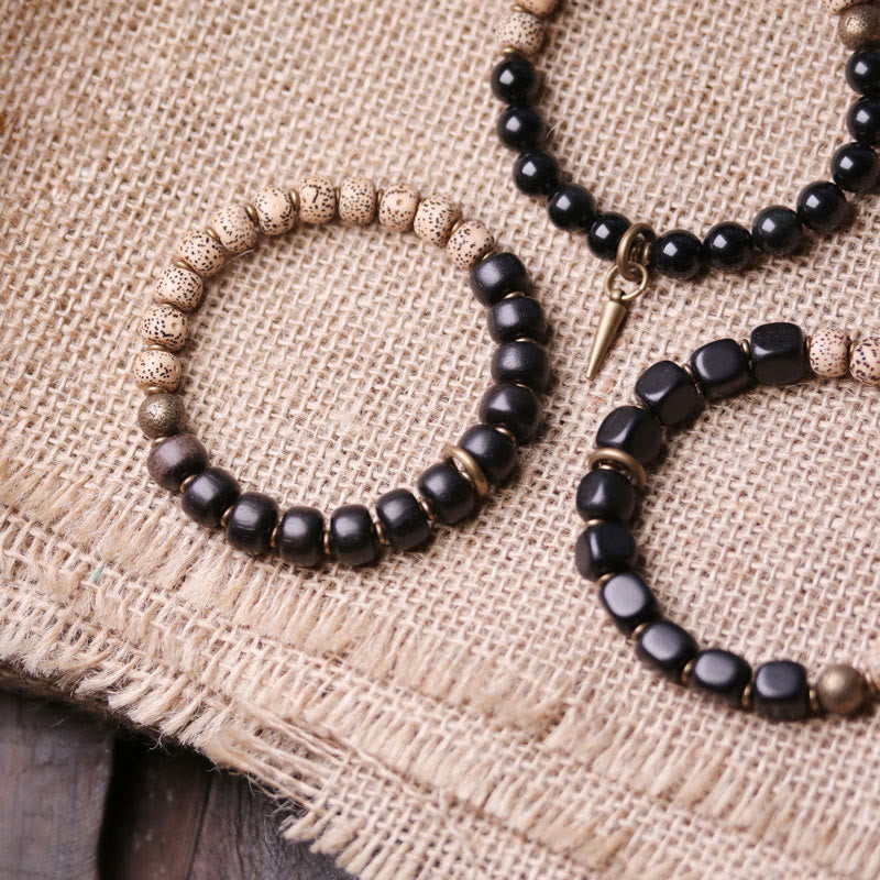 Buddha Stones Tibetaanse Bodhizaadarmband van zwarte obsidiaan , ebbenhout en koper - image 3