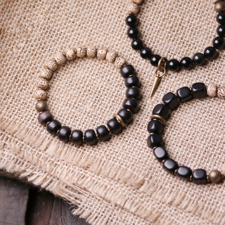 Buddha Stones Tibetaanse Bodhizaadarmband van zwarte obsidiaan , ebbenhout en koper - image 3