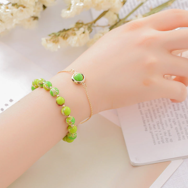 Buddha Stones Zonnesteen Aardbeikwarts Kristal Positieve Armband - Groene Keizersteen - image 13