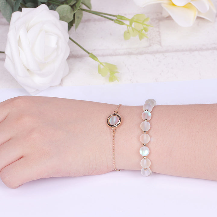 Buddha Stones Zonnesteen Aardbeikwarts Kristal Positieve Armband - Zwarte glittersteen - image 44