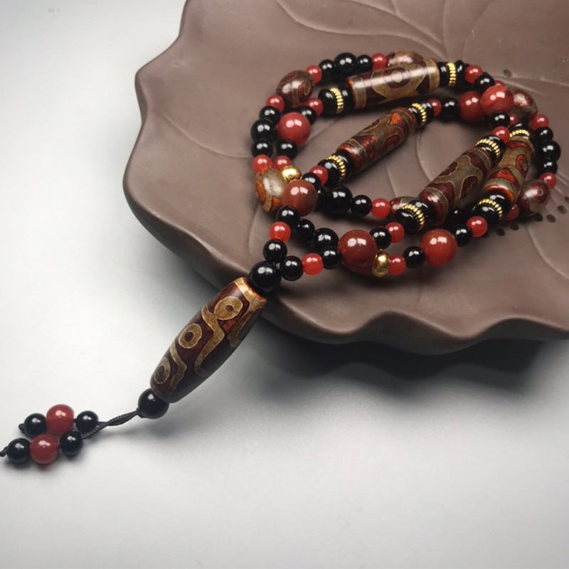 Buddha Stones Ketting met negenogen Dzi-kralen van rode agaat, symbool voor rijkdom en gezondheid. - image 2