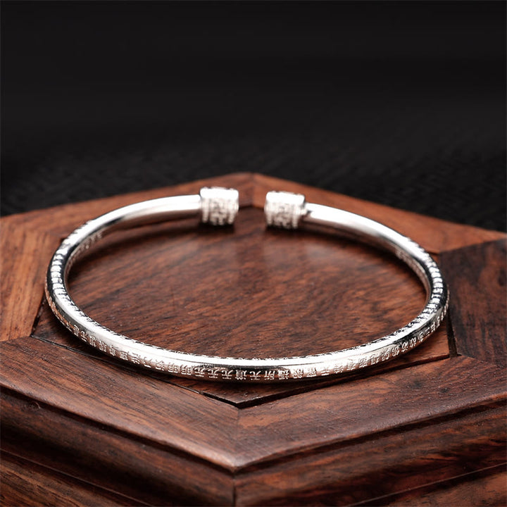Buddha Stones Bangle-armband van wit koper met gegraveerd hakenkruispatroon en de tekst "Heart Sutra" (gelukssymbool). - Hartsoetra- Bangle - image 0