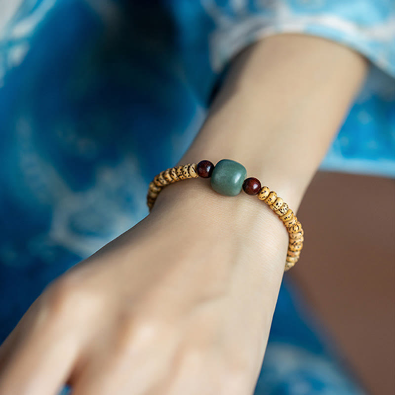 Buddha Stones Armband van Bodhizaad, kleine blaadjes en rood sandelhout. - image 8