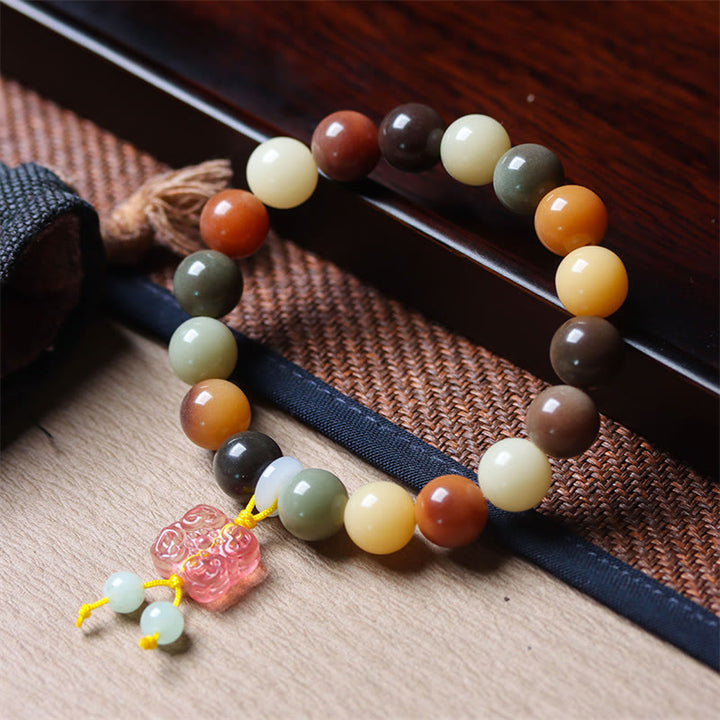 Buddha Stones Natuurlijke veelkleurige Bodhizaad Liuli glazen bedel Armband - Bodhizaad Roze Liuli Glazen Bedeltje (Polsomtrek 14-17 cm) - image 0