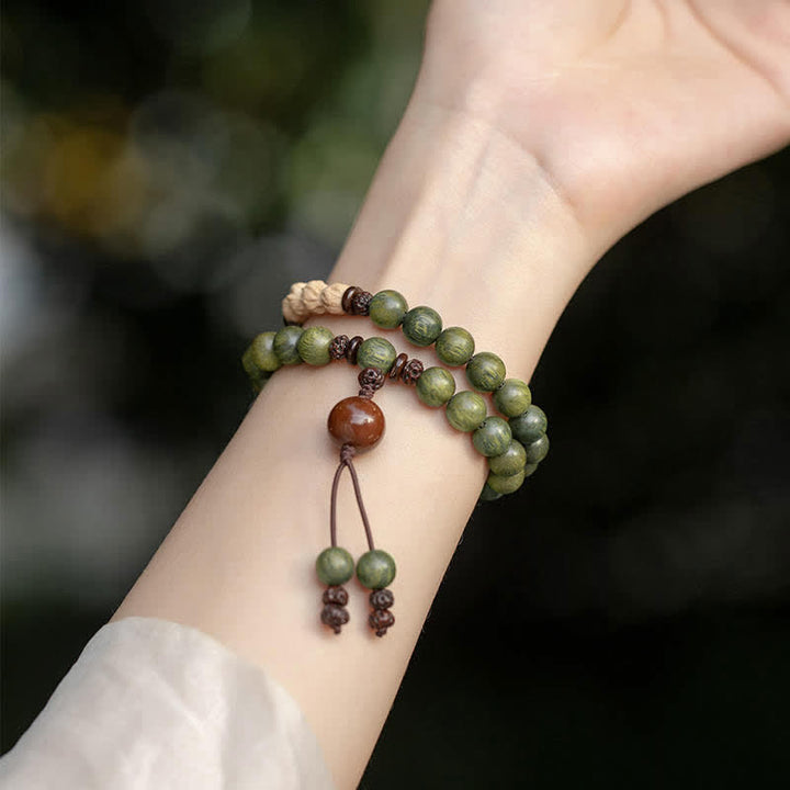 Buddha Stones Groene sandelhouten Armband met positieve boodschap en vredesmotief - image 2
