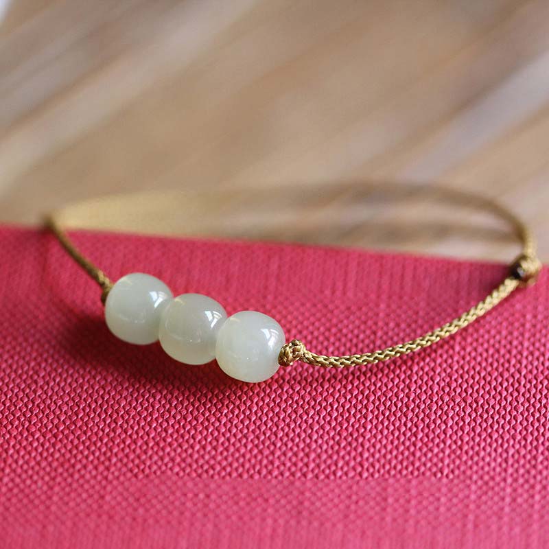 Buddha Stones Armband met drie jade kralen en gelukssymbool, geweven met een touwtje. - image 5