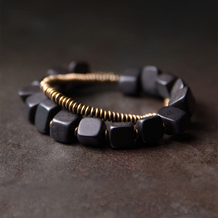 Buddha Stones Tibetaanse Armband van ebbenhout en koper met vredesmotief, dubbele wikkeling - 18 cm - image 0