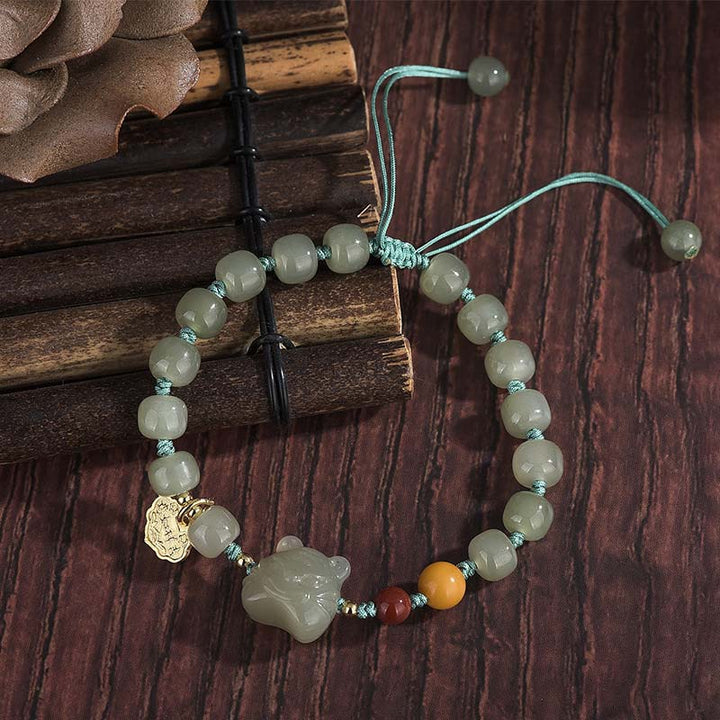 Armband met Chinese dierenriemteken van tijger en jade, een zegeningskoord. - image 2