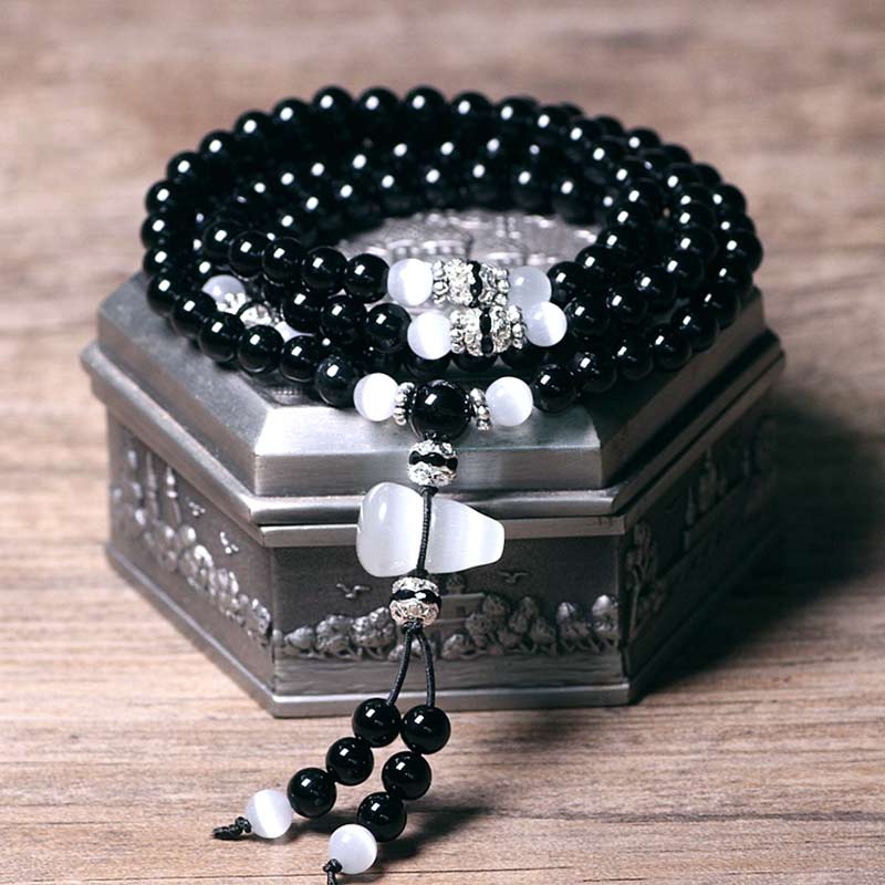 Buddha Stones Armband met kralen van zwarte onyx en witte kristallen - Zwarte onyx - image 0