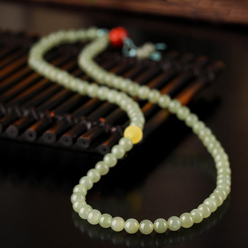 Buddha Stones Armband met lachende Boeddha, symbool van jade, rode agaat en amber. - image 4