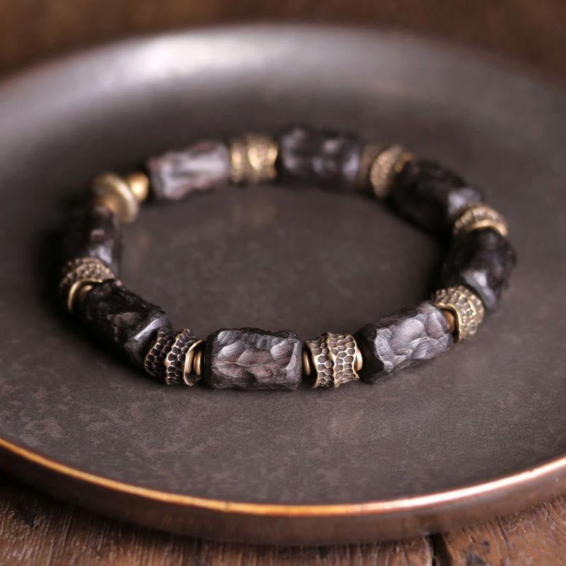 Buddha Stones Tibetaanse Armband van ebbenhout en koper, symbool voor rust en vrede. - 18 cm - Normaal type - image 0