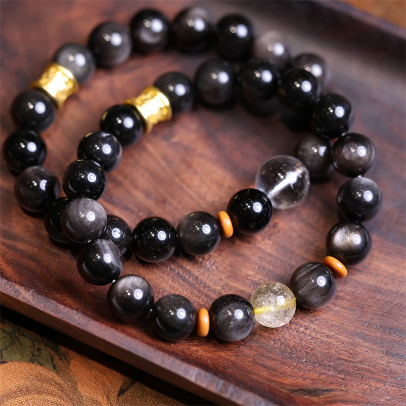 Buddha Stones Armband van obsidiaankristal met natuurlijke zilverglans en Om Mani Padme Hum -kralen. - image 1