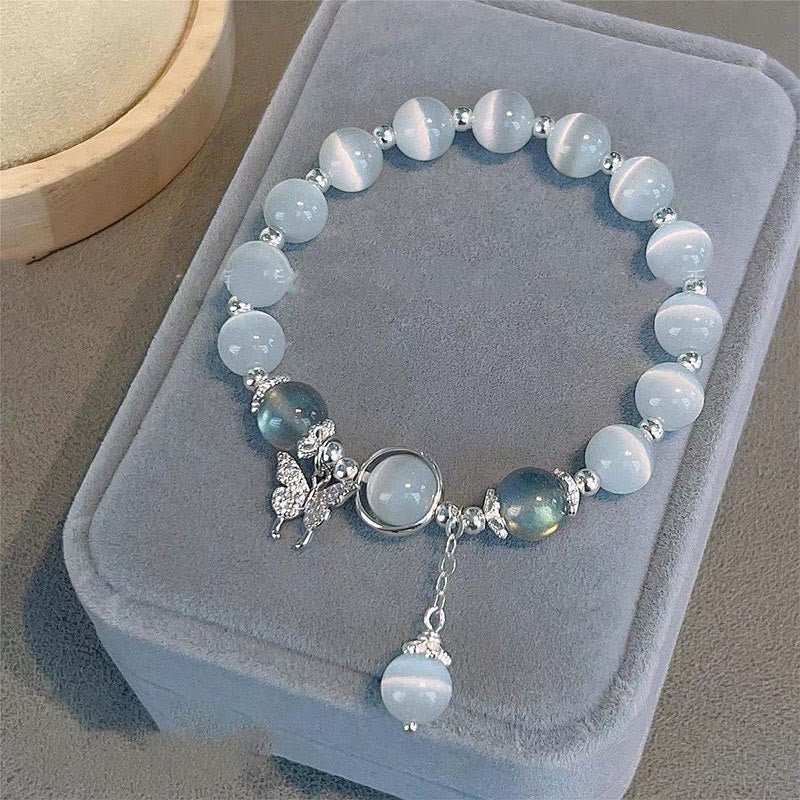 Buddha Stones Armband met bedeltjes van kattenoog, maansteen, vlinder en ster - Kattenoog &amp; Maansteen Vlinder - image 0