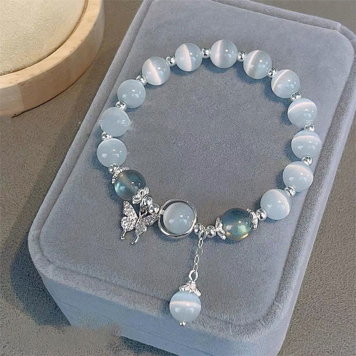 Buddha Stones Armband met bedeltjes van kattenoog, maansteen, vlinder en ster - Kattenoog &amp; Maansteen Vlinder - image 0