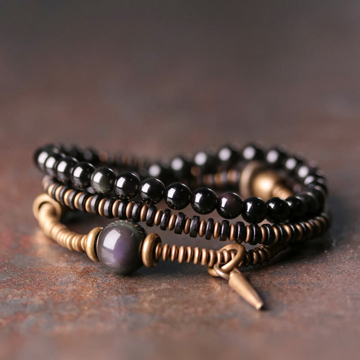 Buddha Stones Regenboog Obsidiaan Ebbenhout Koper Genezende Drievoudige Armband - Regenboogobsidiaan - 18 cm - image 0