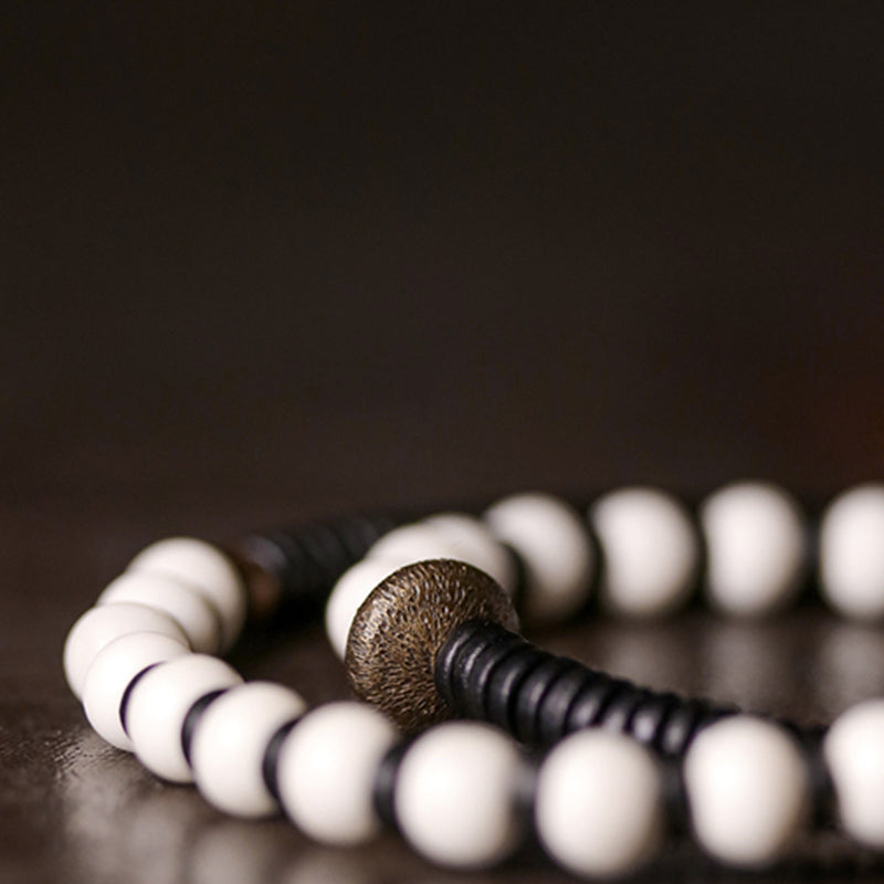 Buddha Stones Armband voor stellen, gemaakt van beenkralen, ebbenhout en koper. - image 8