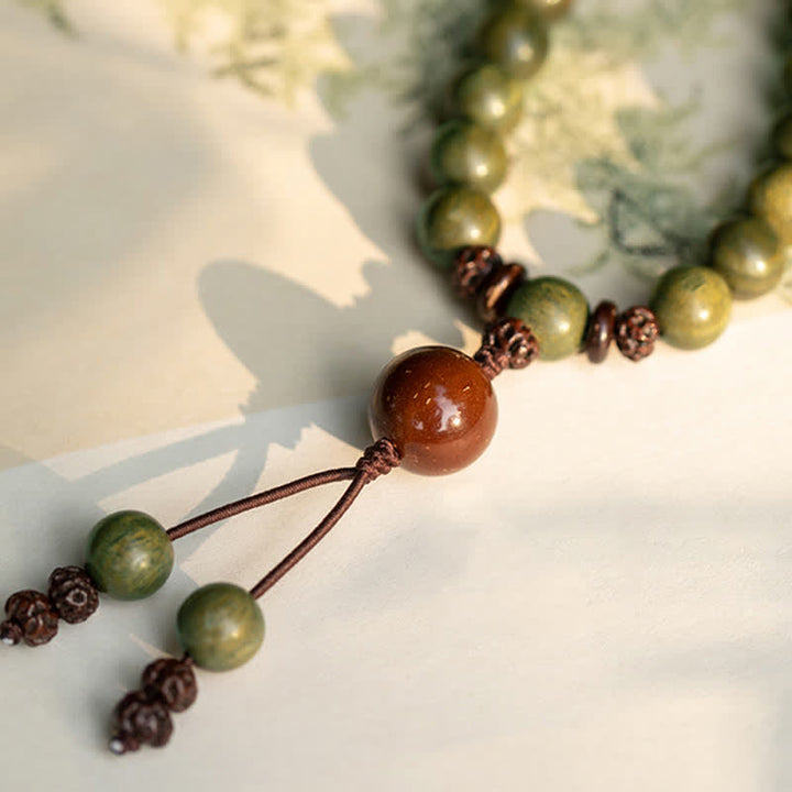 Buddha Stones Groene sandelhouten Armband met positieve boodschap en vredesmotief - image 11