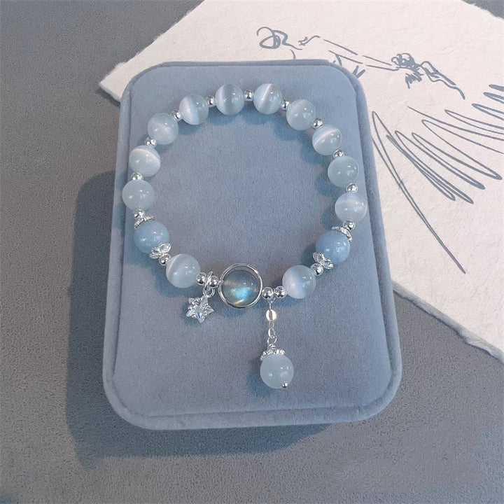 Buddha Stones Armband met bedeltjes van kattenoog, maansteen, vlinder en ster - image 10