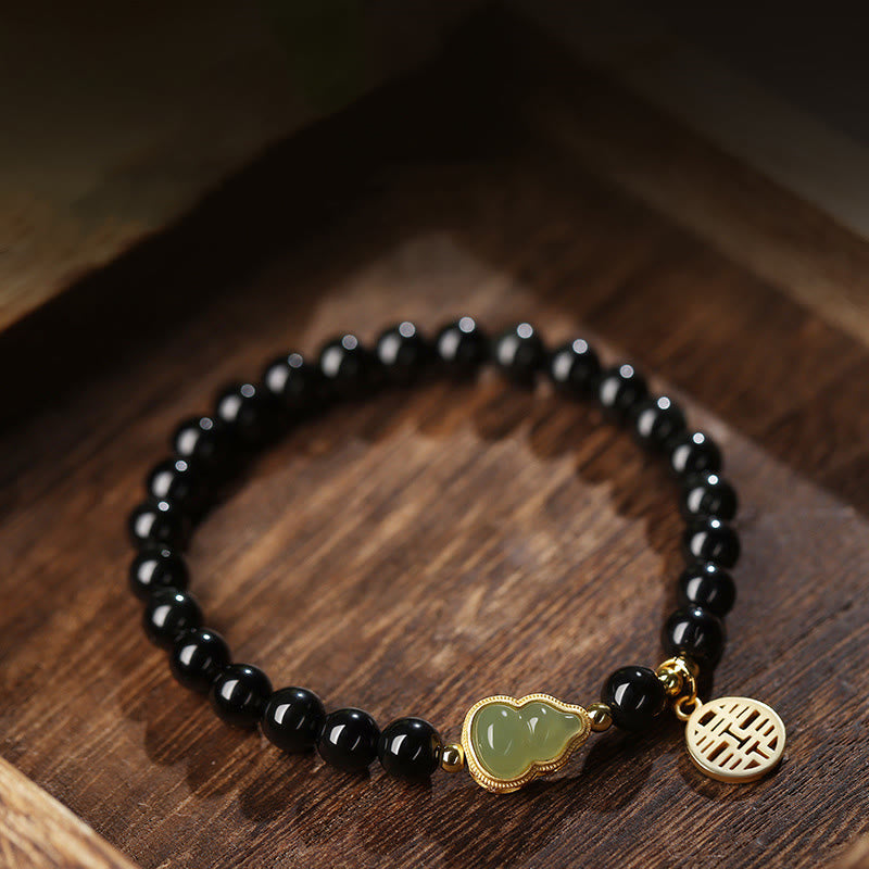Buddha Stones Armband van natuurlijke zwarte obsidiaan Hetian jade, dubbel geluk en kracht. - image 1