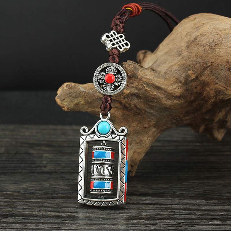 Buddha Stones Sleutelhanger met zes ware woorden, een draaibare knoop en een zegenmotief. - image 1