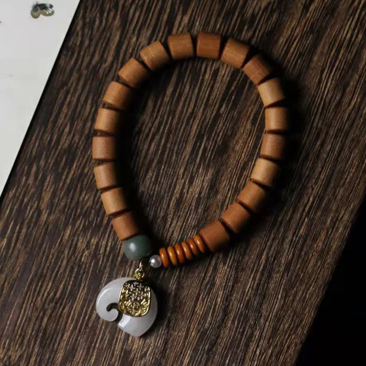Buddha Stones Armband van sandelhout en jade met olifantje - image 12