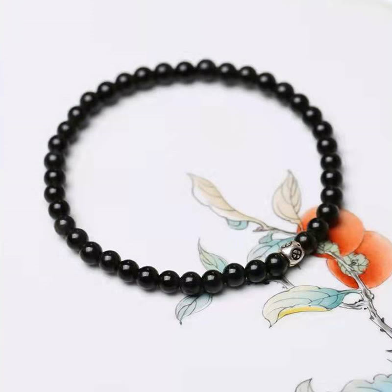 Buddha Stones Armband van natuurlijke zwarte obsidiaan en rookkwarts voor zuivering en versterking. - image 1