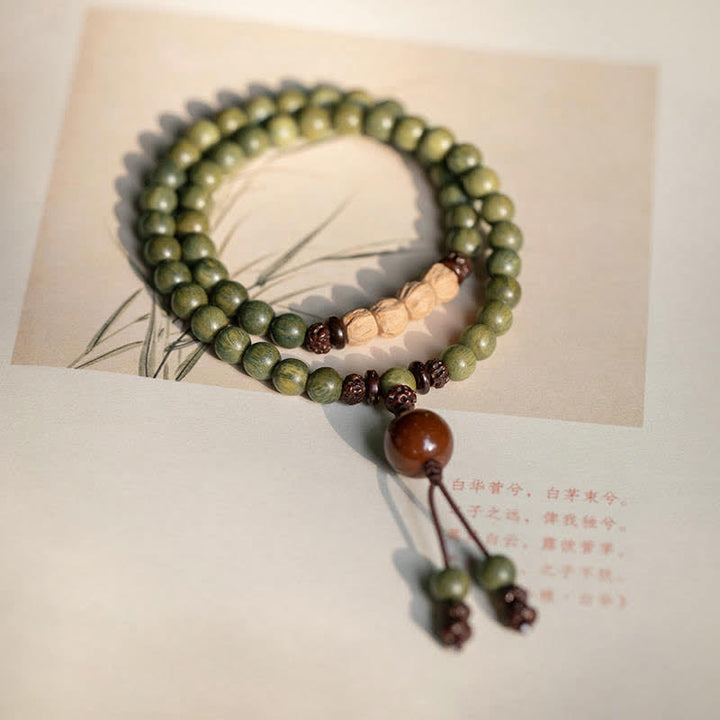 Buddha Stones Groene sandelhouten Armband met positieve boodschap en vredesmotief - image 9