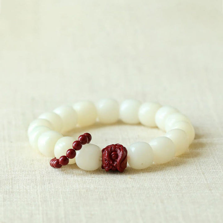 Buddha Stones Natuurlijke Bodhizaad Cinnaber Dansende Leeuw Amulet Wijsheid Harmonie Pols Mala - Bodhizaad (Wijsheid♥Houd boze geesten op afstand) - image 0