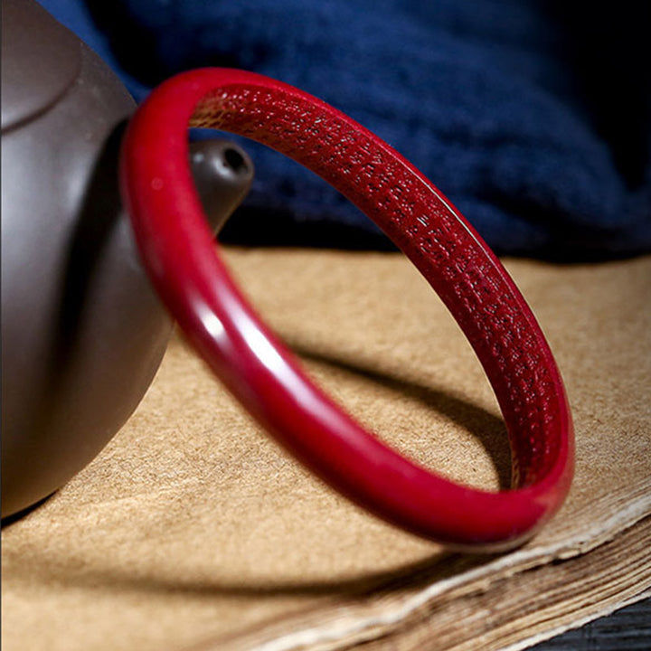 Buddha Stones Armband met gravure van de Hartsoetra van Cinnabar en een zegenmotief. - 63-64 mm - image 0