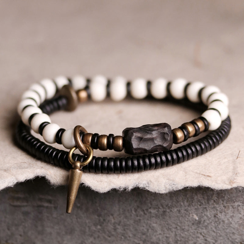 Buddha Stones Armband voor stellen, gemaakt van beenkralen, ebbenhout en koper. - 18 cm - image 0