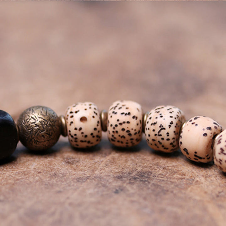 Buddha Stones Tibetaanse Bodhizaadarmband van zwarte obsidiaan , ebbenhout en koper - image 9