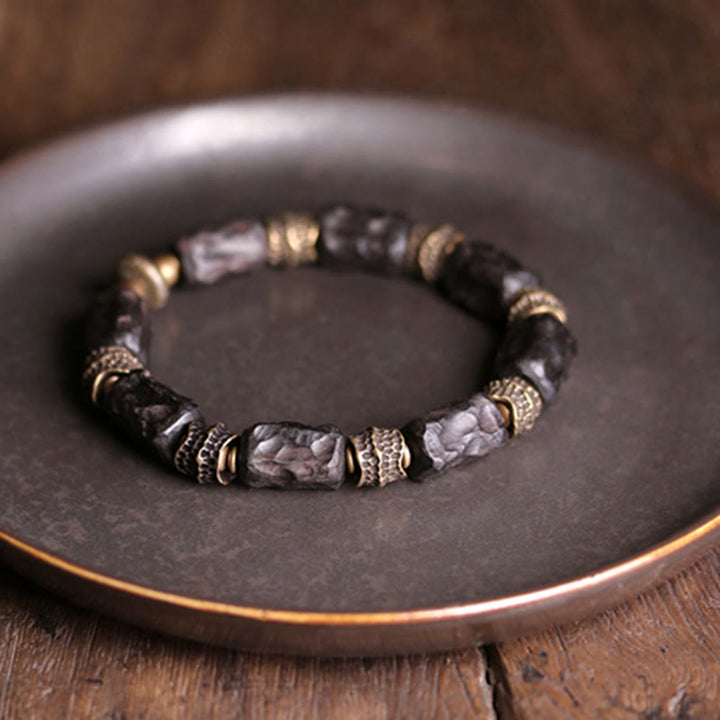 Buddha Stones Tibetaanse Armband van ebbenhout en koper, symbool voor rust en vrede. - image 2