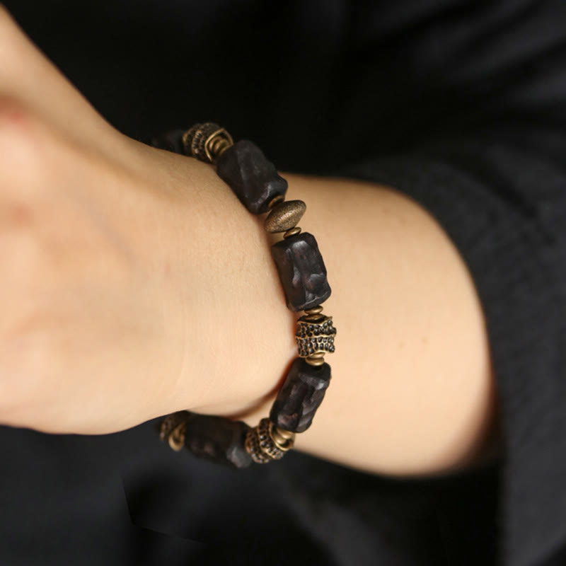 Buddha Stones Tibetaanse Armband van ebbenhout en koper, symbool voor rust en vrede. - image 4