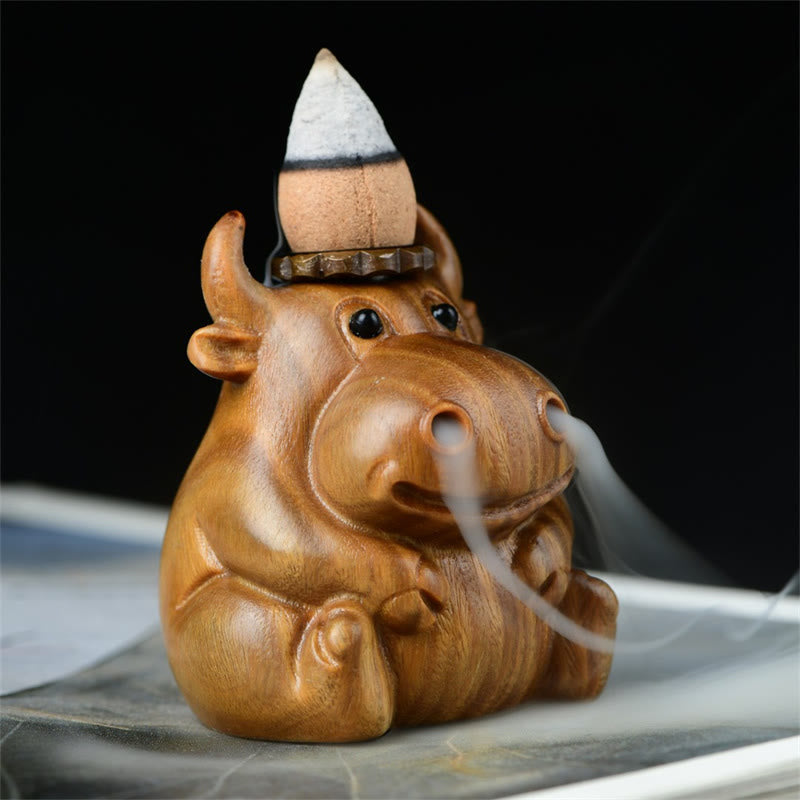 Buddha Stones Decoratie voor een meditatiebrander met terugvloeiende Wierook , gemaakt van groen sandelhout met een schattig kalfjemotief. - Groene sandelhout kalfslederen 55*47*44mm - image 0