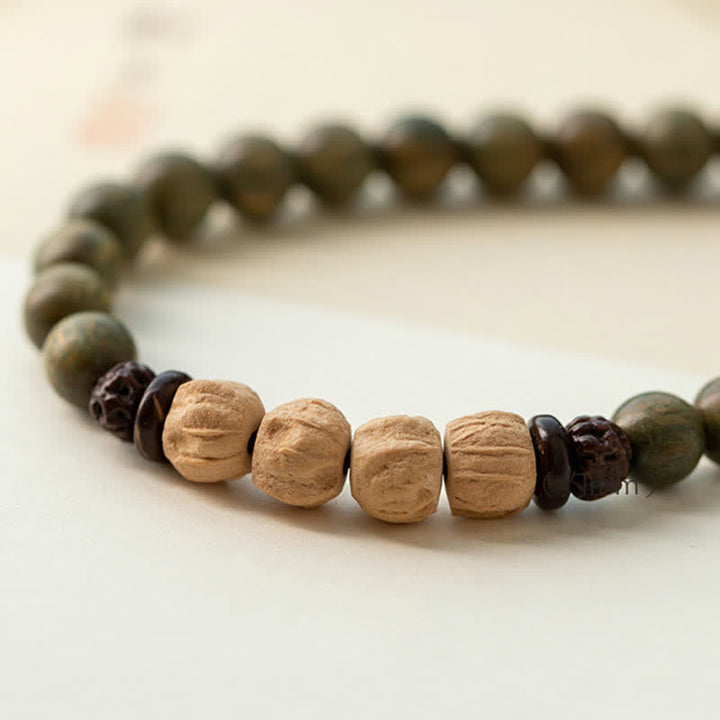 Buddha Stones Groene sandelhouten Armband met positieve boodschap en vredesmotief - image 12